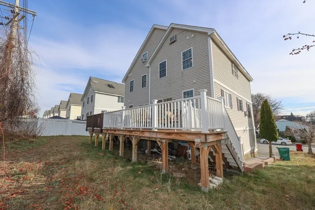 a roof view of a house with a yard