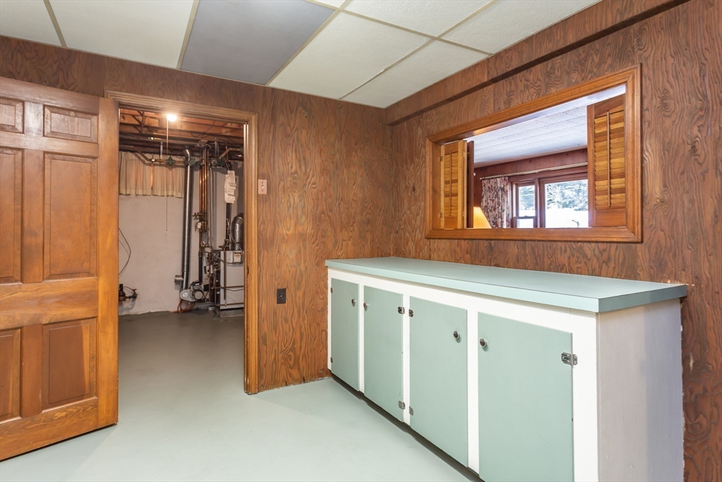 89 Jackson Drive Raynham, MA 02767 - Photo 26 of 30 a view of hallway with washer and dryer