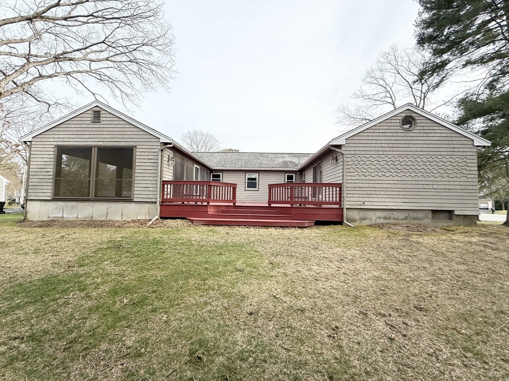 89 Jackson Drive Raynham, MA 02767 - Photo 6 of 30 a view of a house with a yard