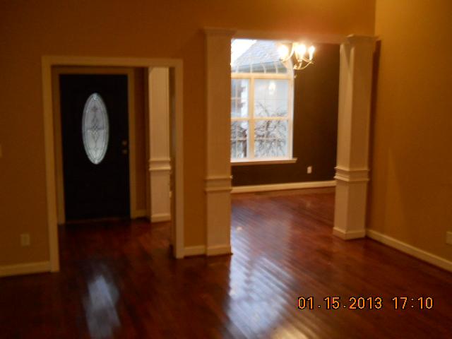 675 Sugar Flat Road Lebanon, TN 37087 - Photo 11 of 20 a view of a room with wooden floor and windows