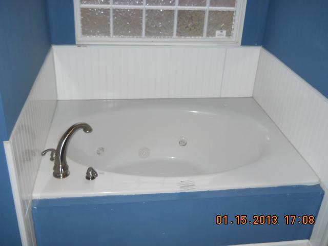 675 Sugar Flat Road Lebanon, TN 37087 - Photo 8 of 20 a bathroom with a sink