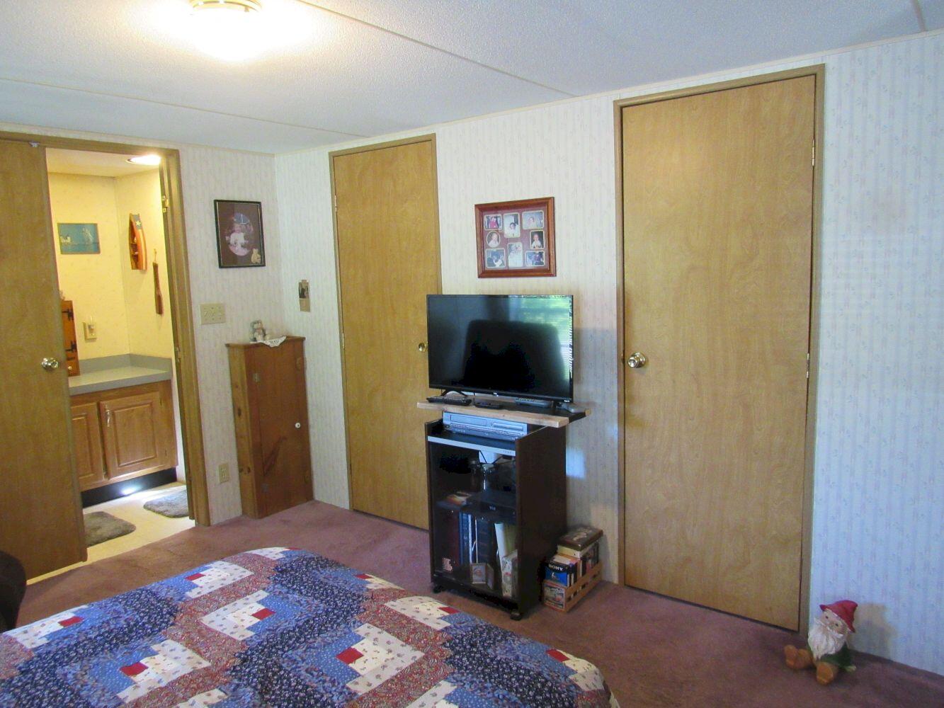 24 Patterson Bridge Road North Anson, ME 04958 - Photo 12 of 22 #12 Dual Closets - Primary Bedroom