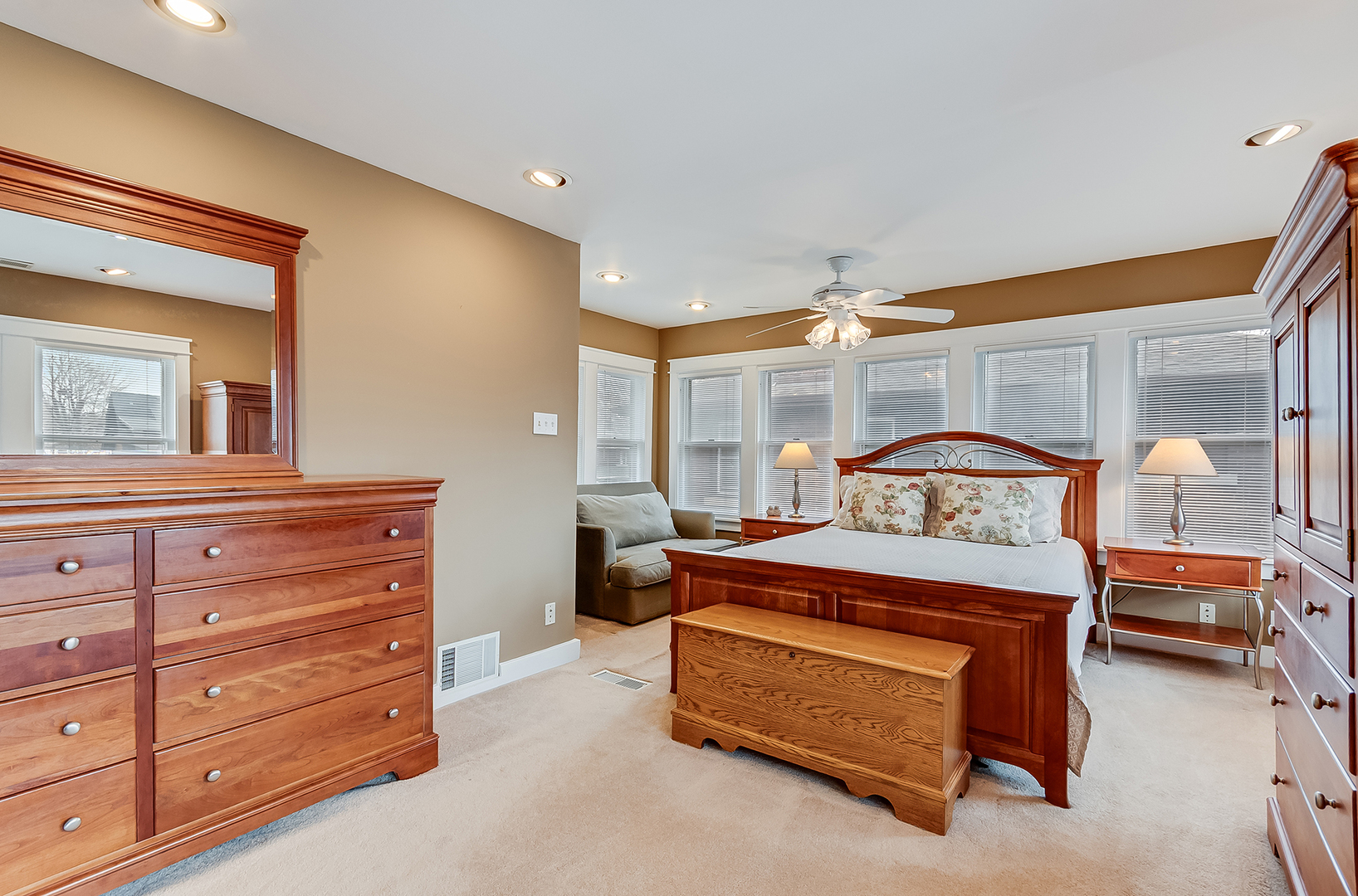 409 Cornelia Street Joliet, IL 60435 - Photo 12 of 27 a bedroom with a bed and a dresser