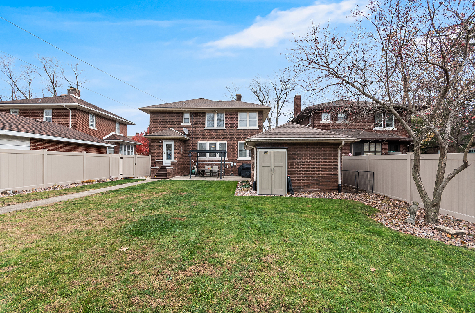 409 Cornelia Street Joliet, IL 60435 - Photo 24 of 27 a front view of a house with a yard