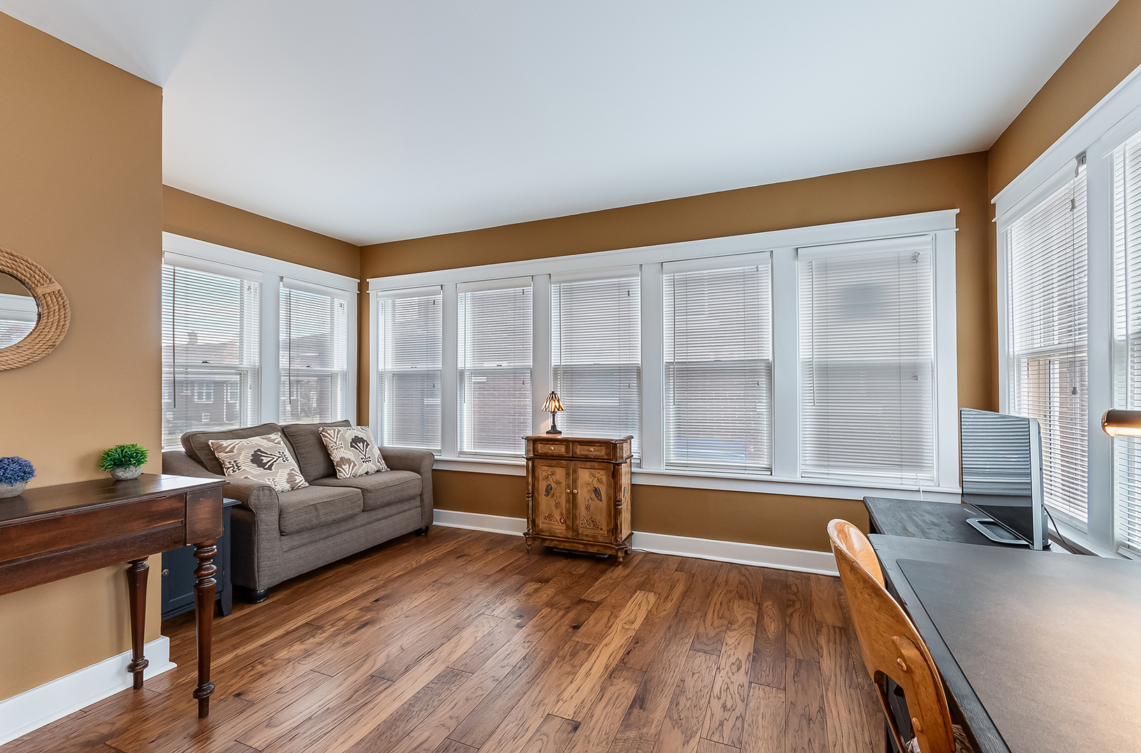 409 Cornelia Street Joliet, IL 60435 - Photo 5 of 27 a living room with furniture and a large window