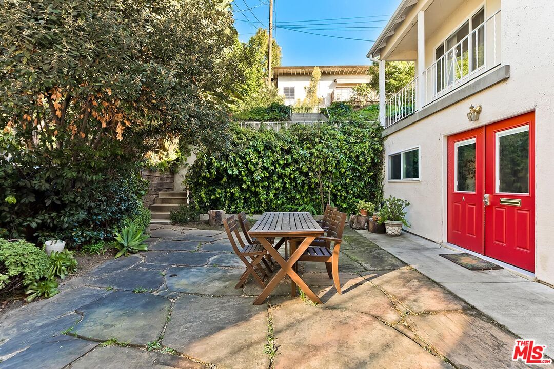 2106 Rockford Road Los Angeles, CA 90039 - Photo 22 of 66 a view of a chairs and table in the patio