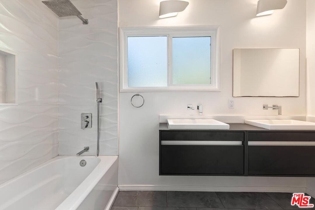 2106 Rockford Road Los Angeles, CA 90039 - Photo 37 of 66 a bathroom with a sink and a bathtub