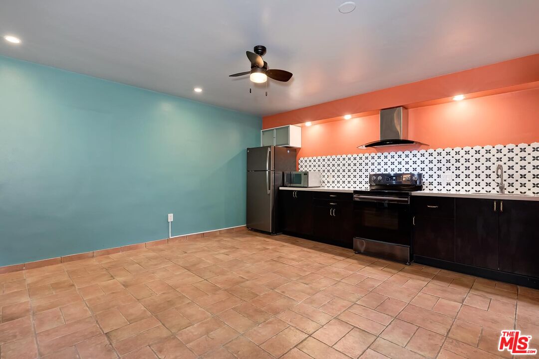 2106 Rockford Road Los Angeles, CA 90039 - Photo 43 of 66 a kitchen with a sink and cabinets