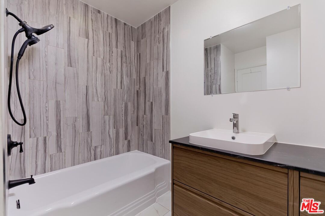 2106 Rockford Road Los Angeles, CA 90039 - Photo 66 of 66 a bathroom with a sink and a mirror
