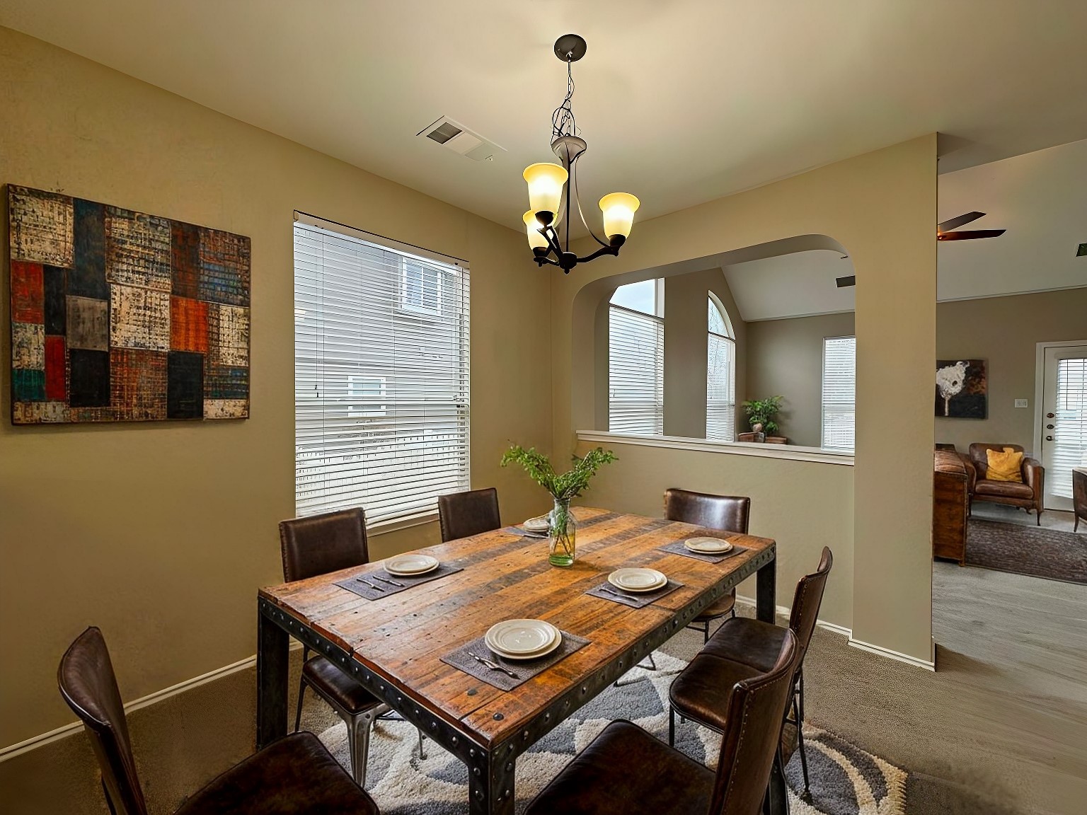 544 Hogan Kyle, TX 78640 - Photo 13 of 40 a view of a dining room with a table and chairs