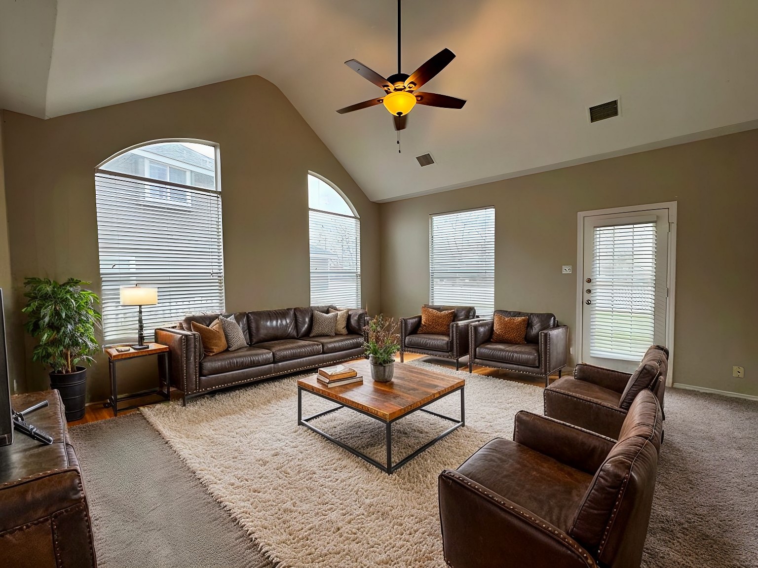 544 Hogan Kyle, TX 78640 - Photo 15 of 40 a living room with furniture ceiling fan and a window