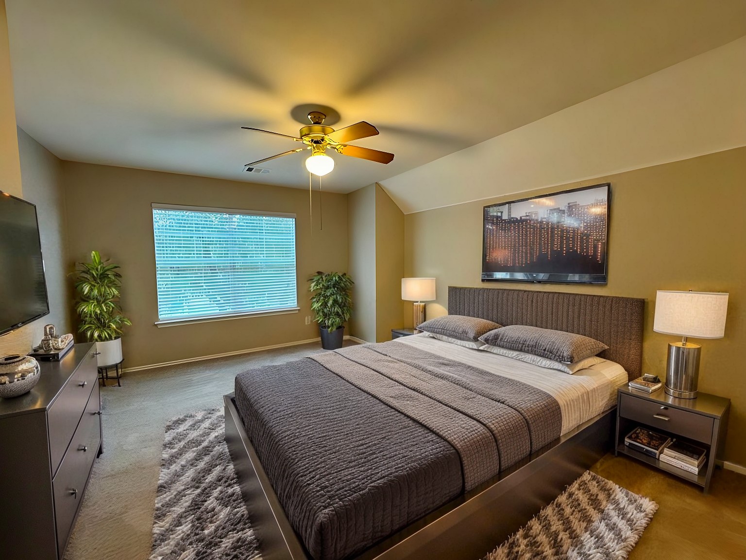 544 Hogan Kyle, TX 78640 - Photo 31 of 40 a bedroom with a bed and a chandelier