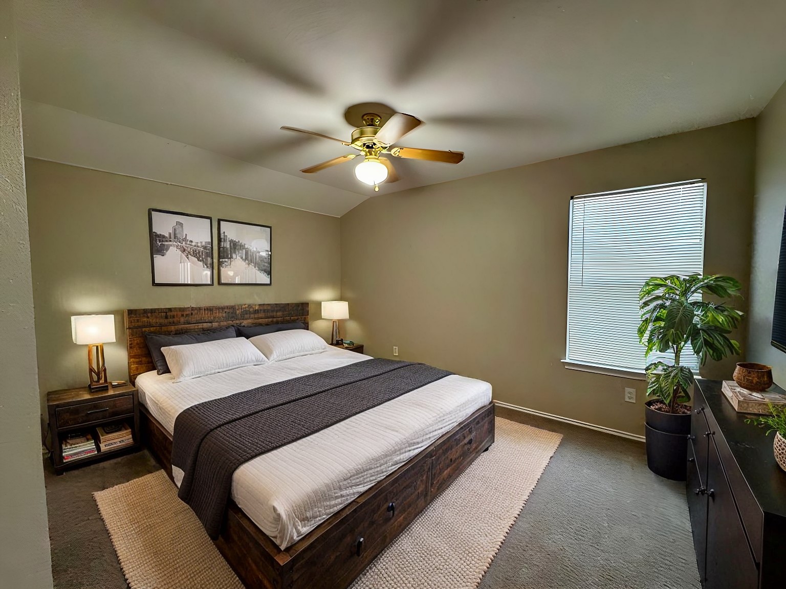 544 Hogan Kyle, TX 78640 - Photo 35 of 40 a bedroom with a bed and a potted plant