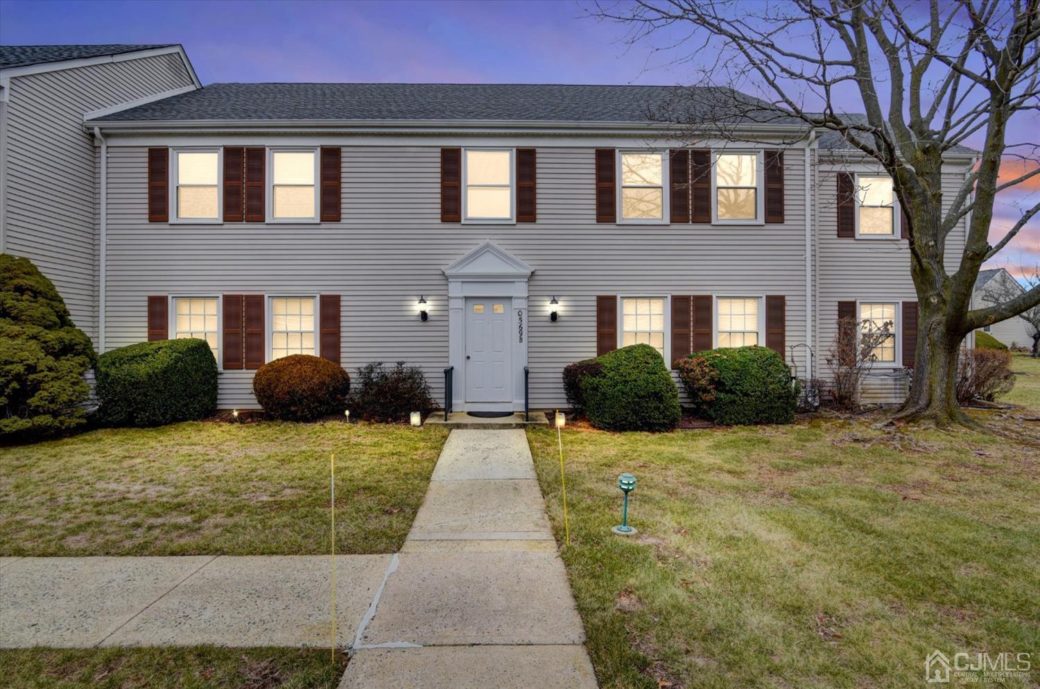 569 Old Nassau Road, Unit O Iselin, NJ 08830 - Photo 1 of 38 a front view of a house with a yard
