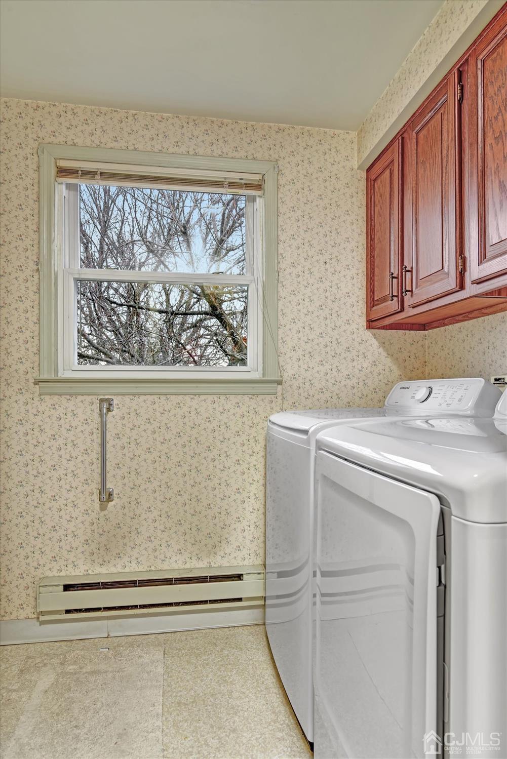 569 Old Nassau Road, Unit O Iselin, NJ 08830 - Photo 12 of 38 a utility room with dryer and washer