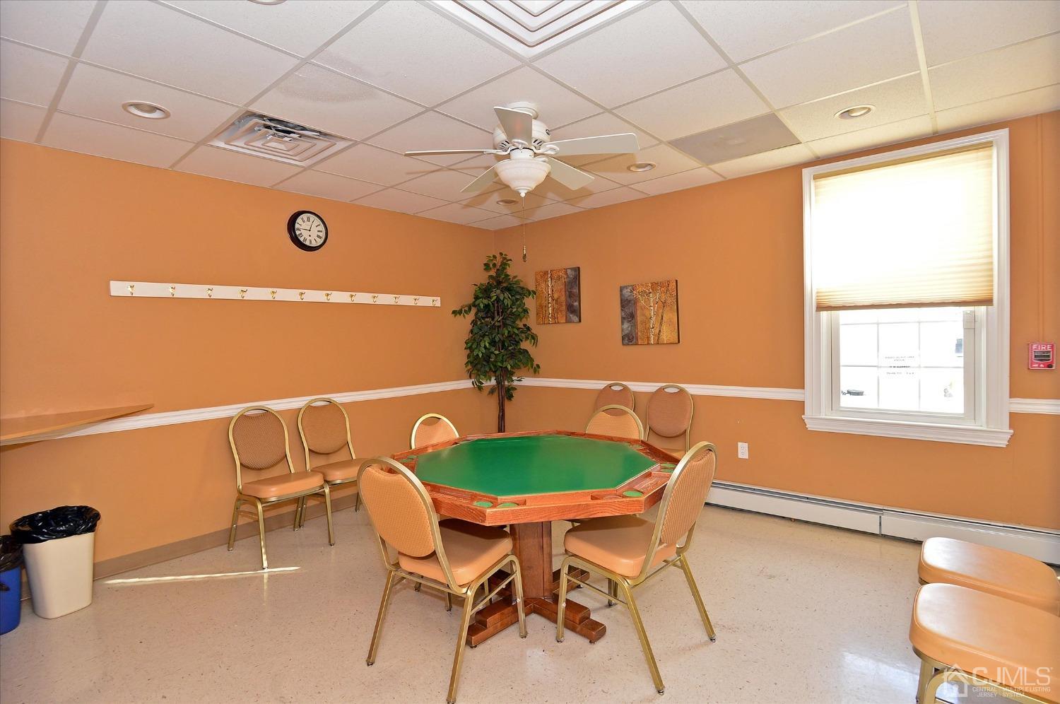 569 Old Nassau Road, Unit O Iselin, NJ 08830 - Photo 19 of 38 a dining room with a table and chairs