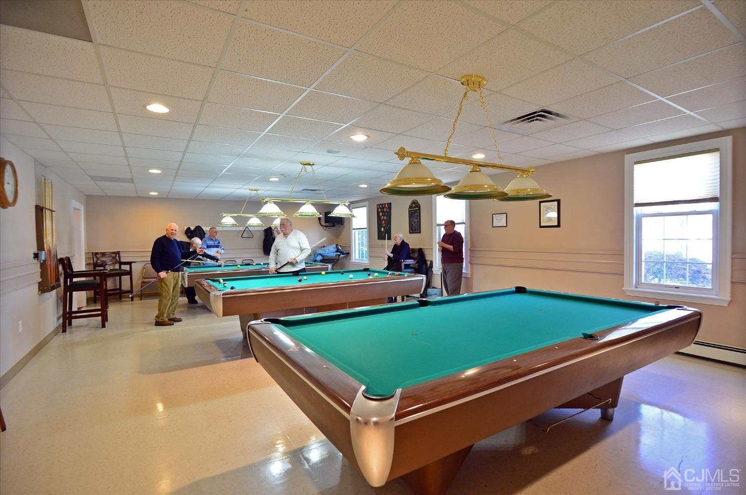 569 Old Nassau Road, Unit O Iselin, NJ 08830 - Photo 20 of 38 a room with pool table table tennis pool table and windows