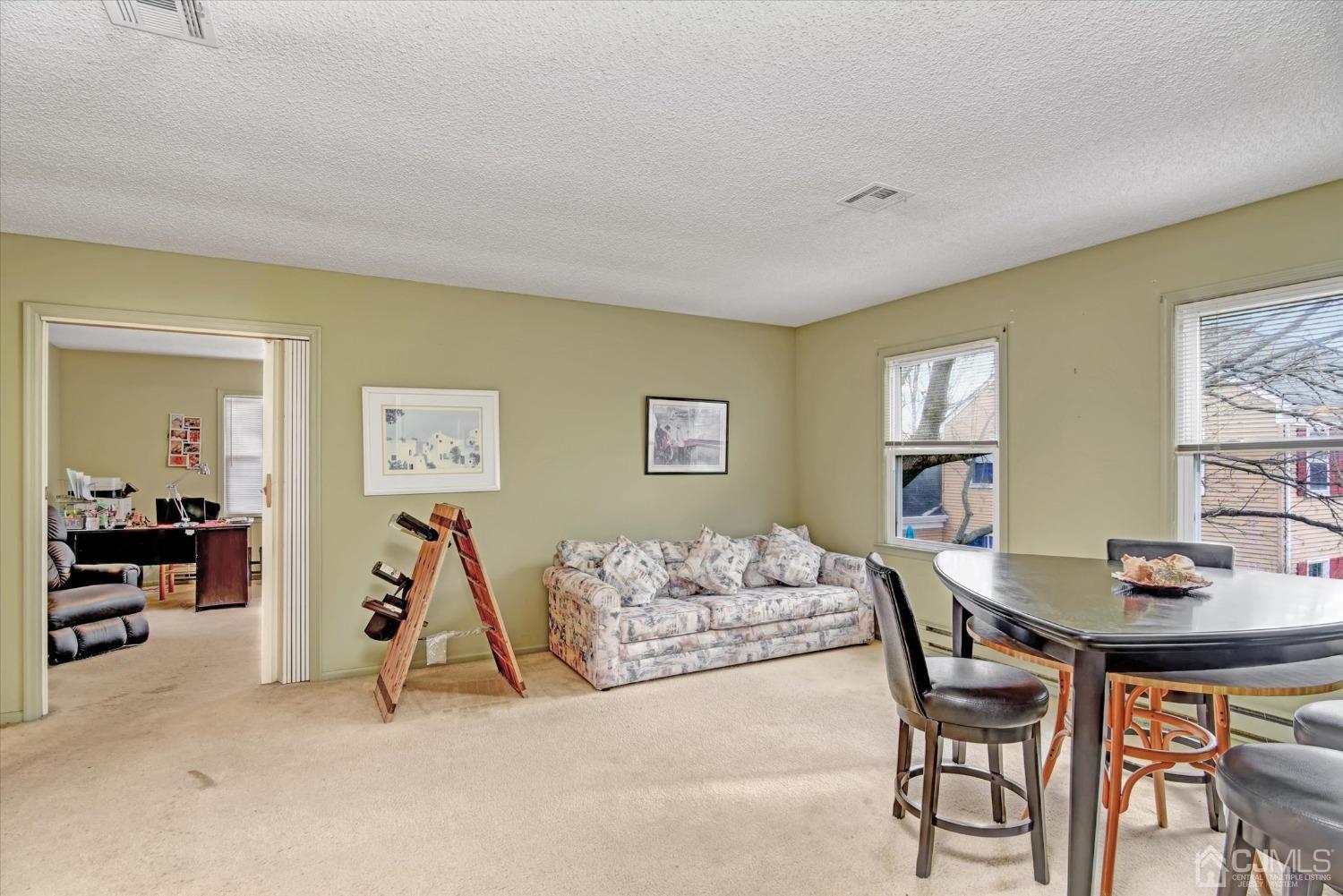 569 Old Nassau Road, Unit O Iselin, NJ 08830 - Photo 2 of 38 a workspace with furniture and window