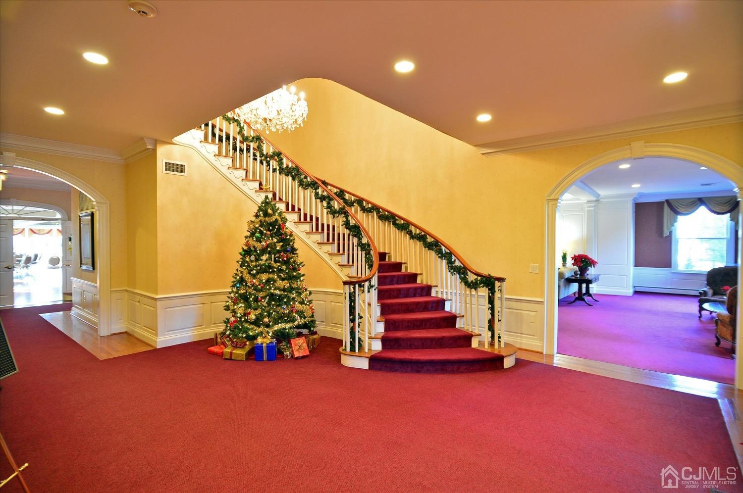 569 Old Nassau Road, Unit O Iselin, NJ 08830 - Photo 27 of 38 a very nice looking room with stairs