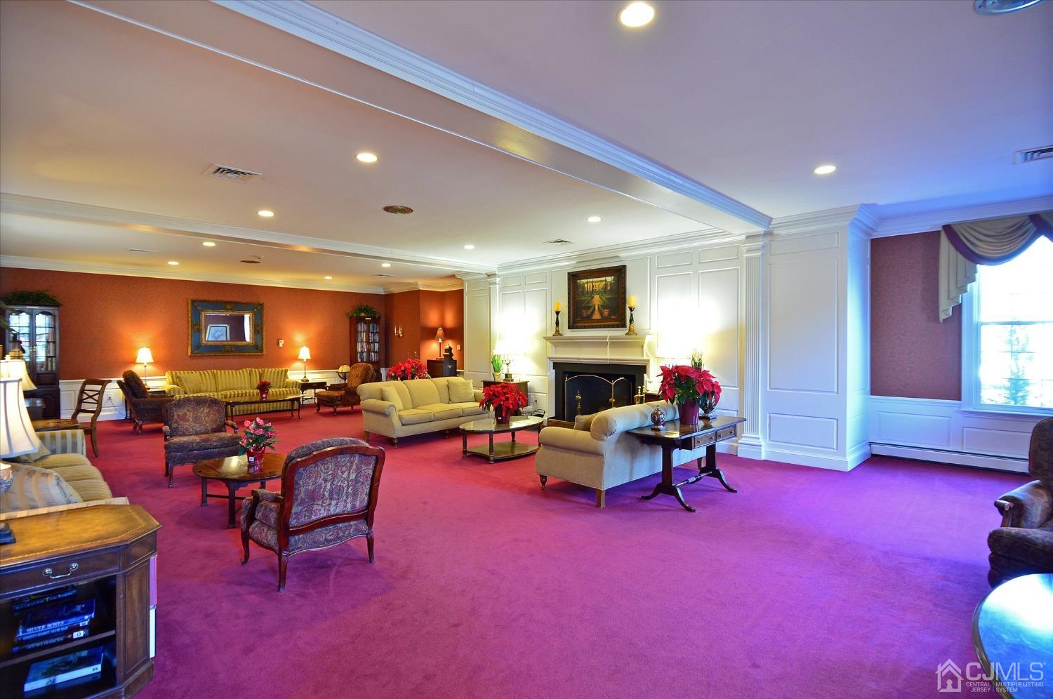 569 Old Nassau Road, Unit O Iselin, NJ 08830 - Photo 28 of 38 a living room with furniture a red lamp and next to a window
