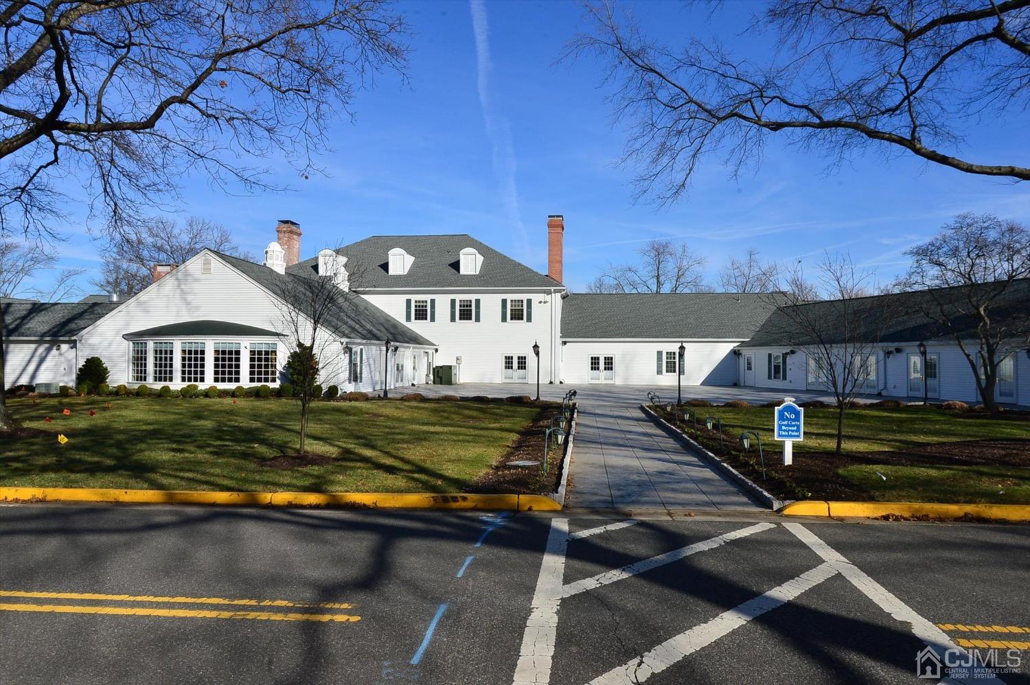 569 Old Nassau Road, Unit O Iselin, NJ 08830 - Photo 35 of 38 a front view of a house with garden