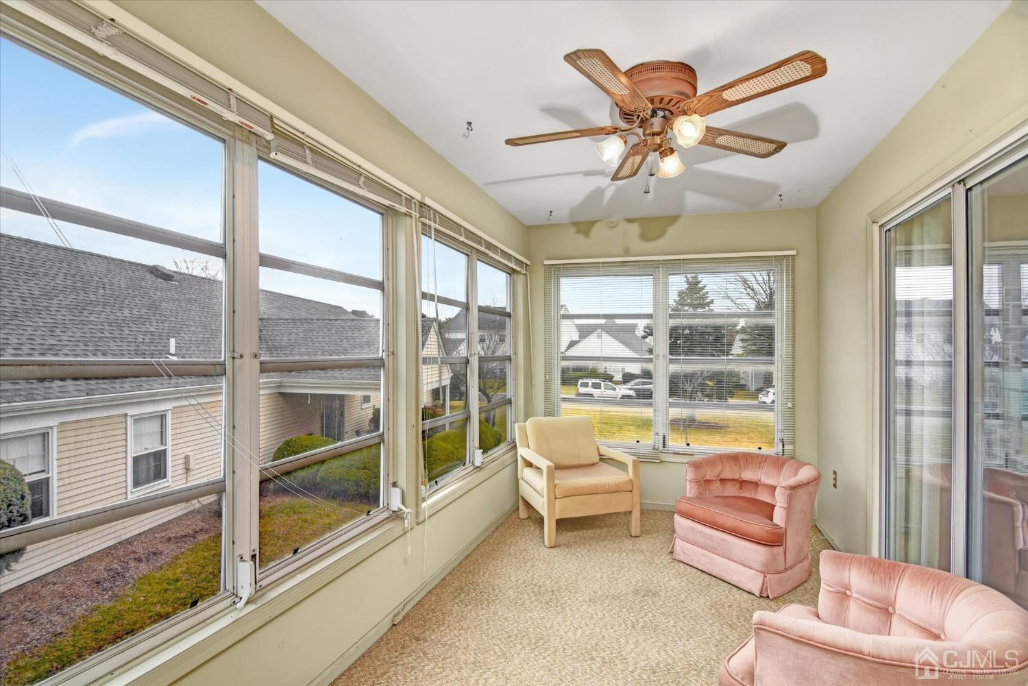 569 Old Nassau Road, Unit O Iselin, NJ 08830 - Photo 6 of 38 a living room with furniture and a large window