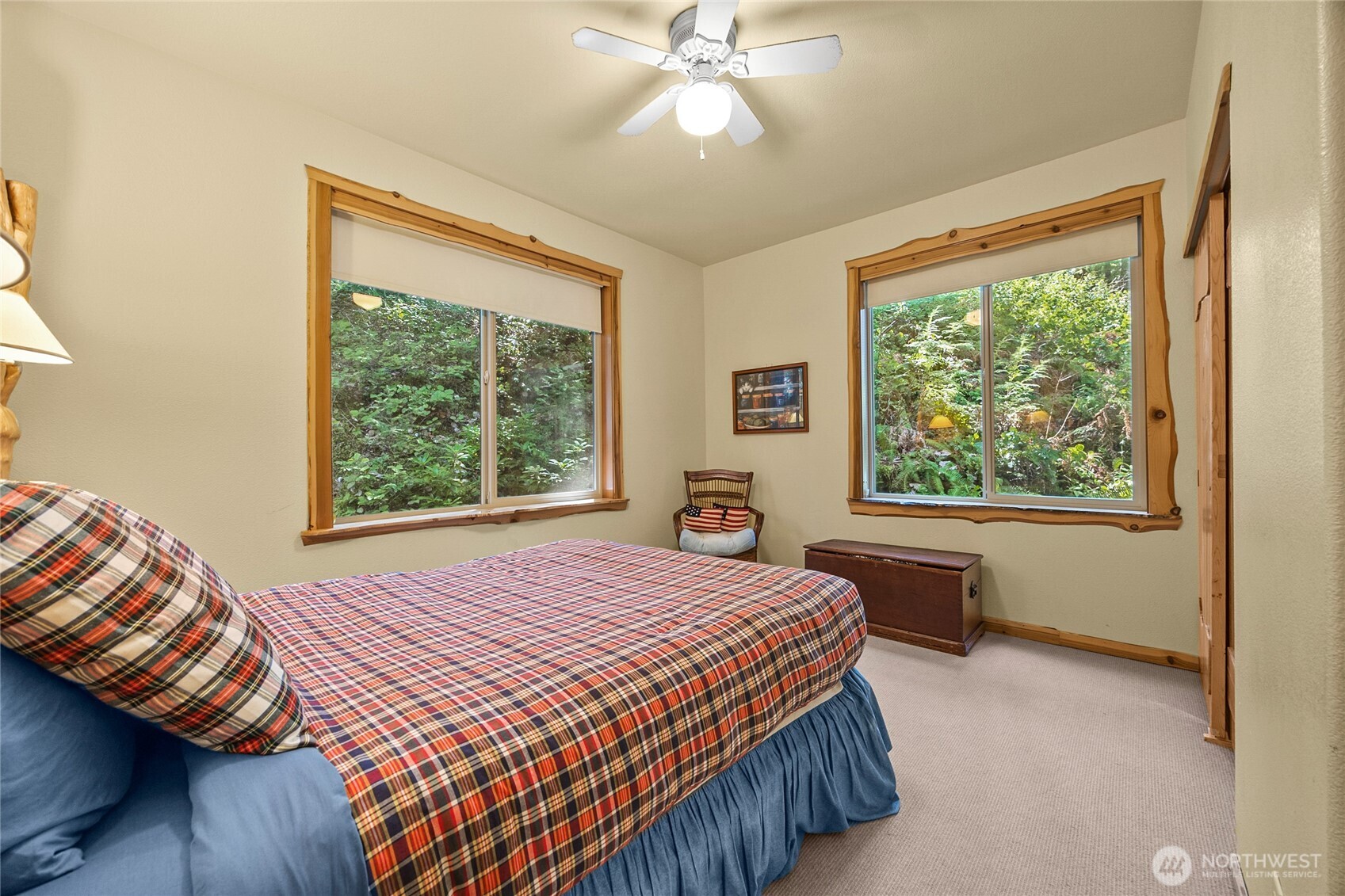 106 Timber Trail Packwood, WA 98361 - Photo 22 of 40 a bedroom with a bed and a window