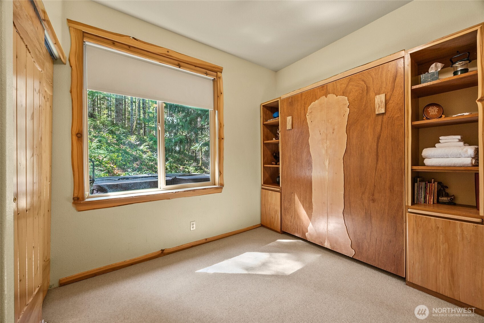 106 Timber Trail Packwood, WA 98361 - Photo 24 of 40 a view of an empty room with a window
