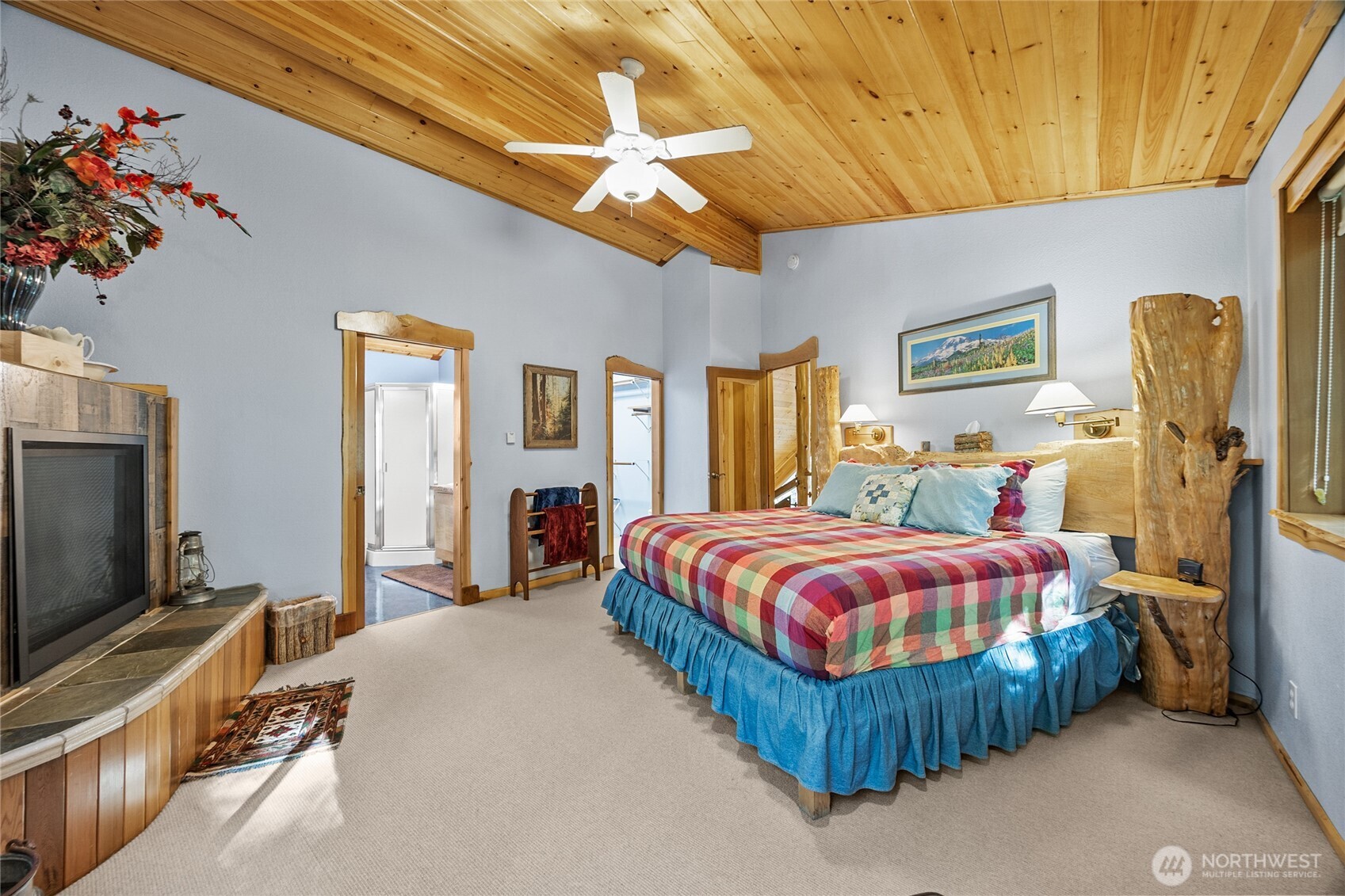 106 Timber Trail Packwood, WA 98361 - Photo 32 of 40 a bedroom with bed and window