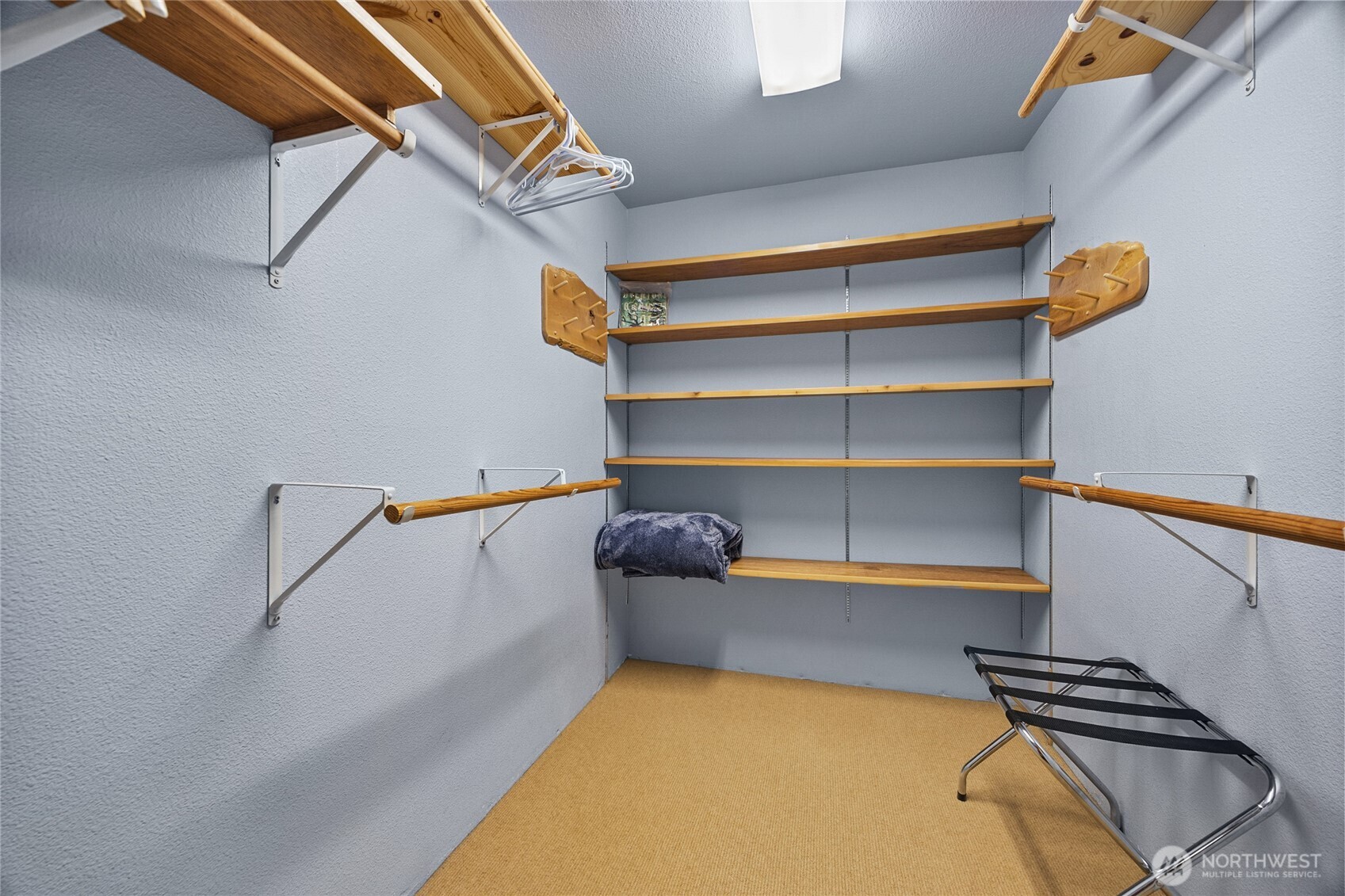 106 Timber Trail Packwood, WA 98361 - Photo 36 of 40 a view of walk in closet with empty racks