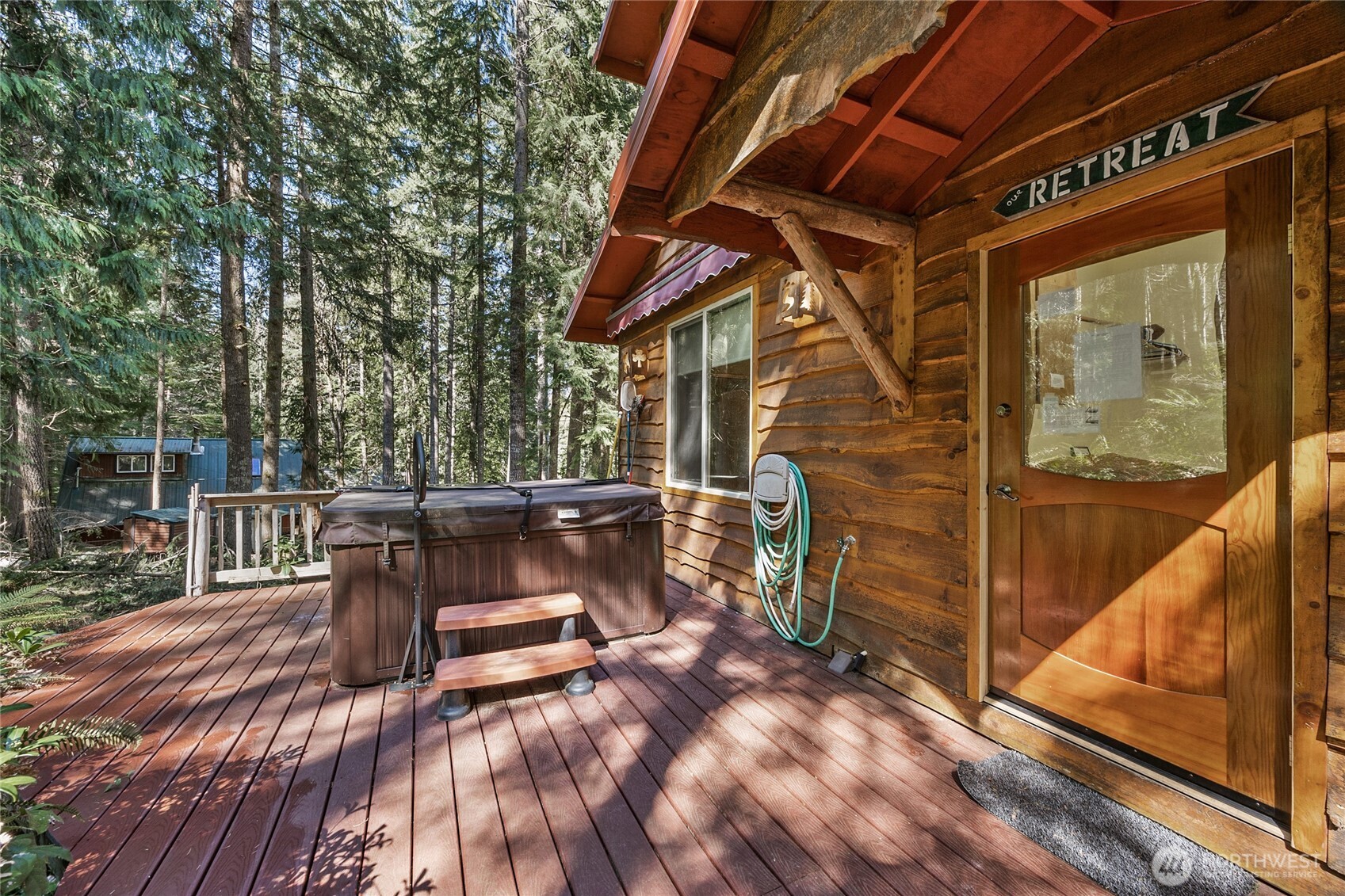 106 Timber Trail Packwood, WA 98361 - Photo 37 of 40 a view of backyard with a deck and wooden floor