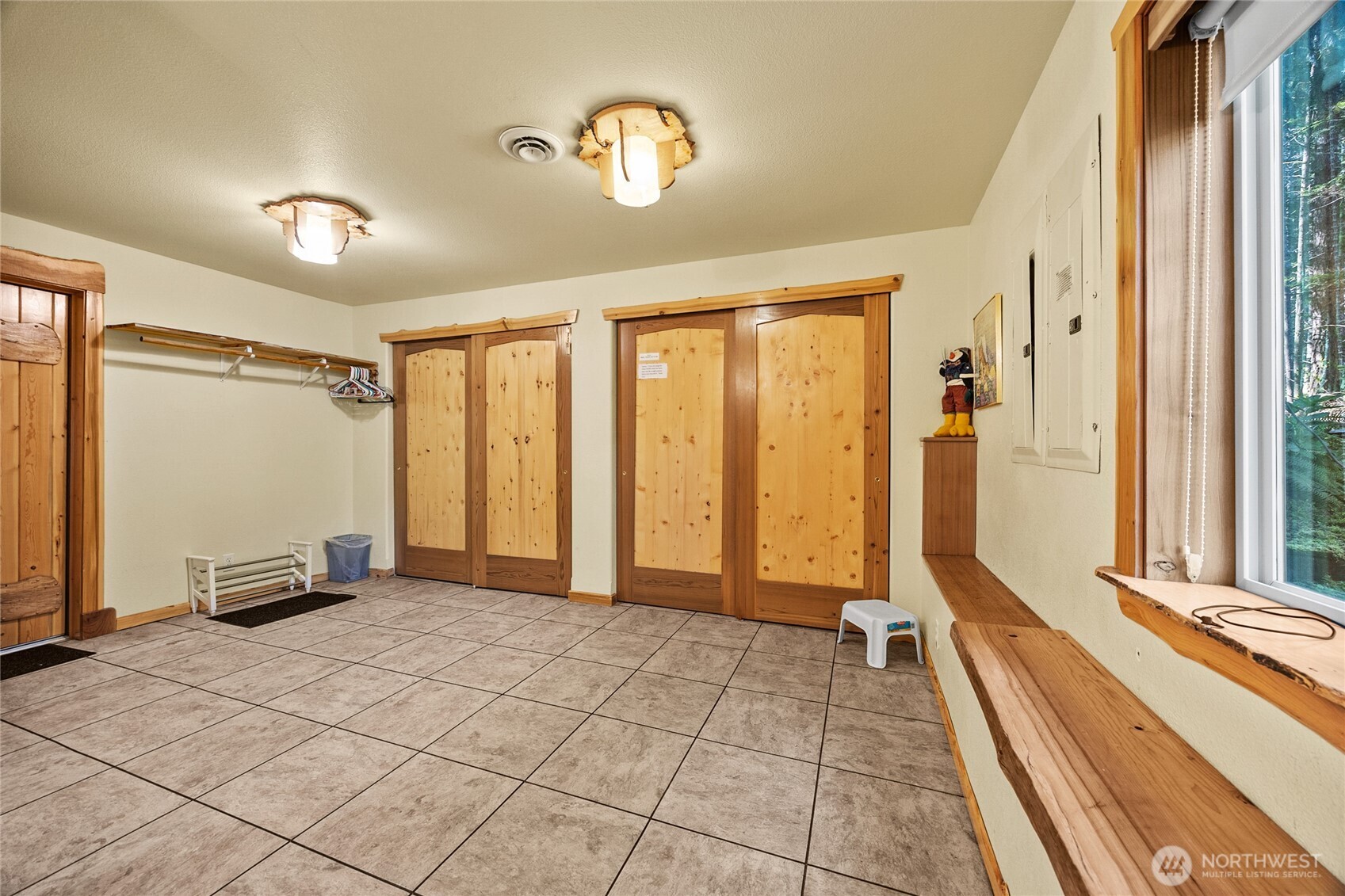 106 Timber Trail Packwood, WA 98361 - Photo 8 of 40 a view of an empty room and a window