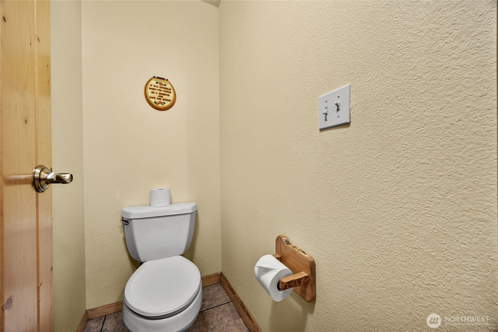 106 Timber Trail Packwood, WA 98361 - Photo 10 of 40 a white toilet sitting next to a white wall