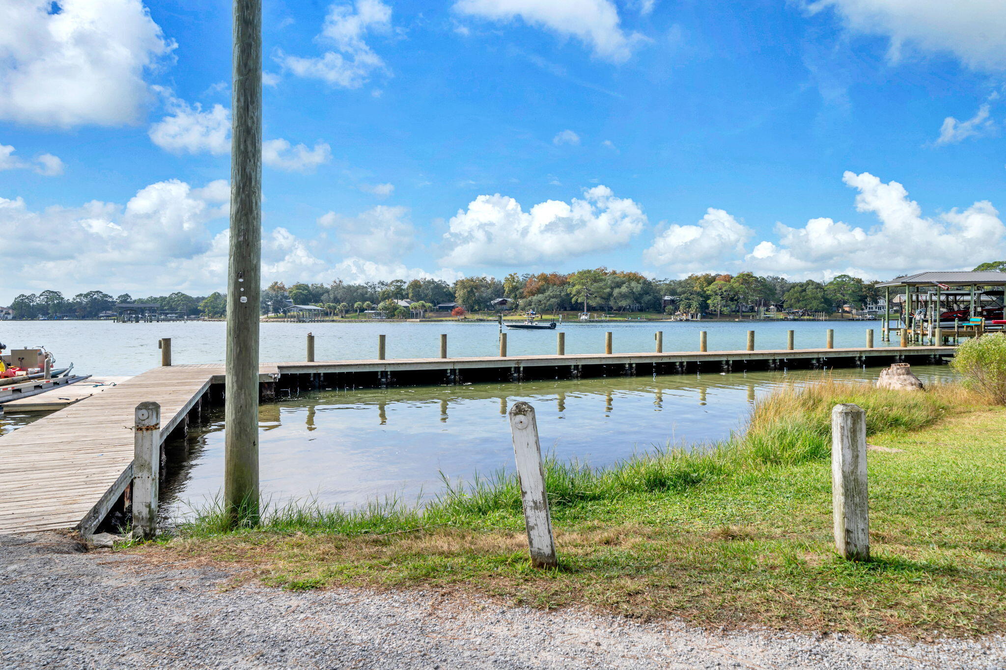 34 Hickory Avenue Shalimar, FL 32579 - Photo 50 of 57 a view of a lake from a yard