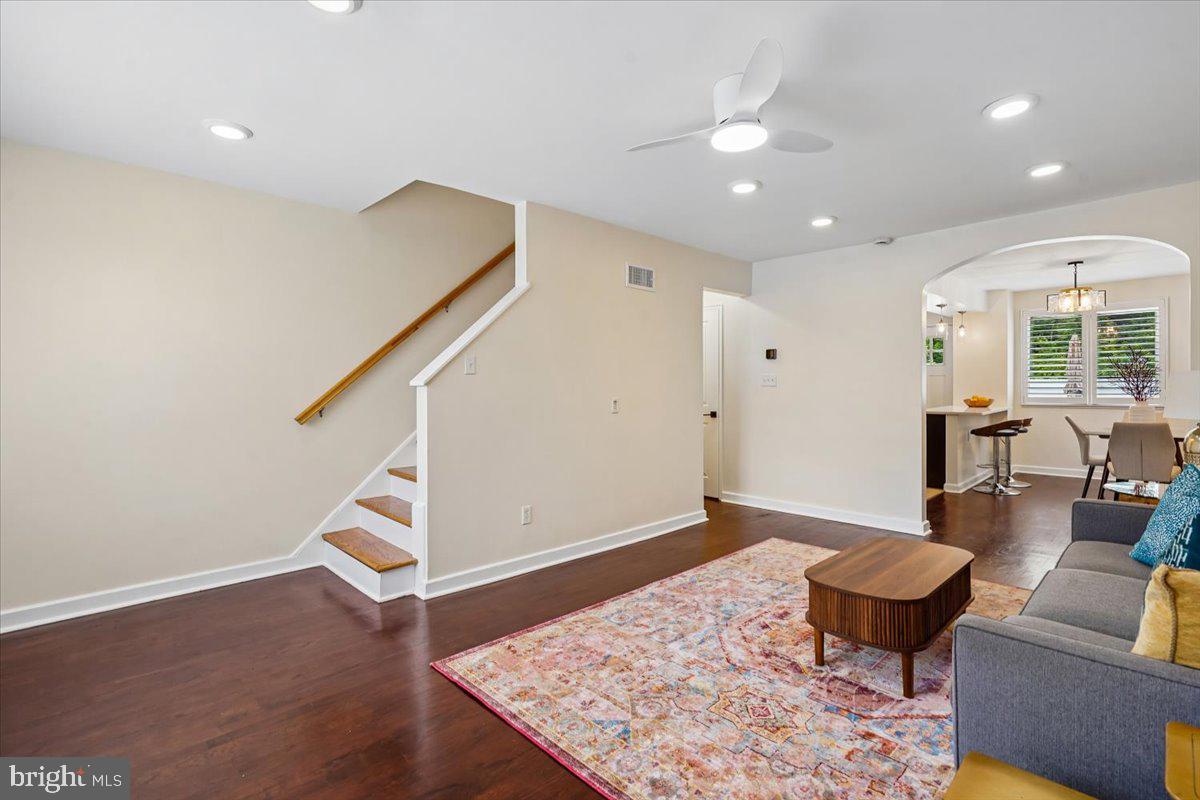 2223 16th Street Northeast Washington, DC 20018 - Photo 12 of 39 a living room with furniture and a rug