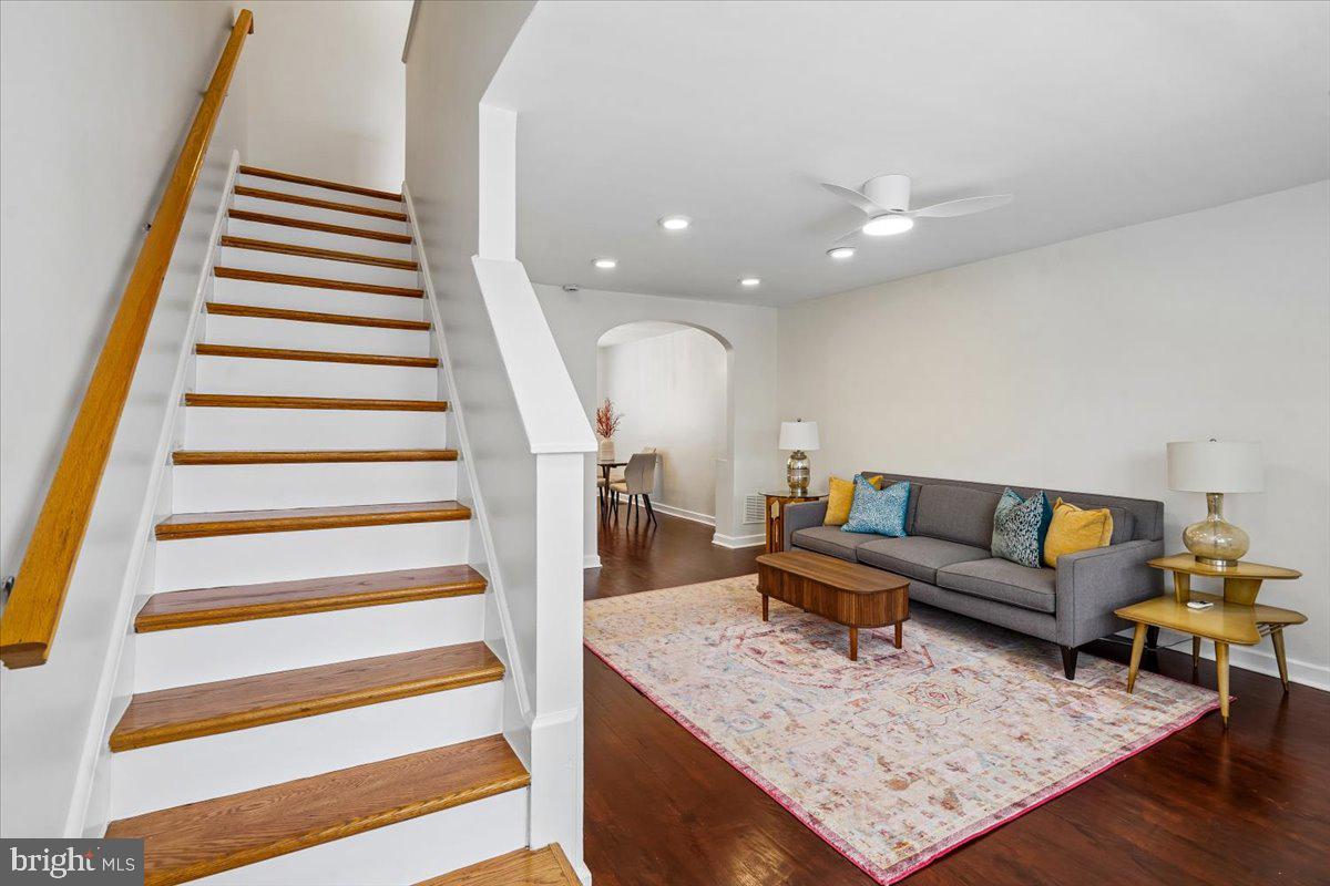 2223 16th Street Northeast Washington, DC 20018 - Photo 20 of 39 a living room with furniture and a fireplace