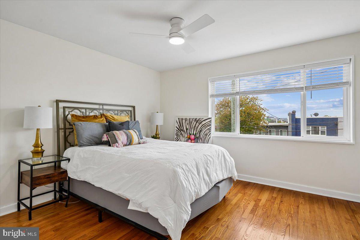 2223 16th Street Northeast Washington, DC 20018 - Photo 21 of 39 a bedroom with a bed and window