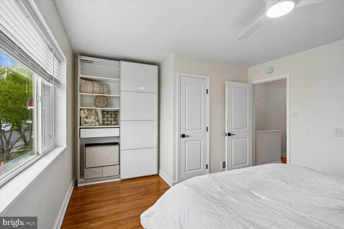 2223 16th Street Northeast Washington, DC 20018 - Photo 23 of 39 a bedroom with a bed and a window