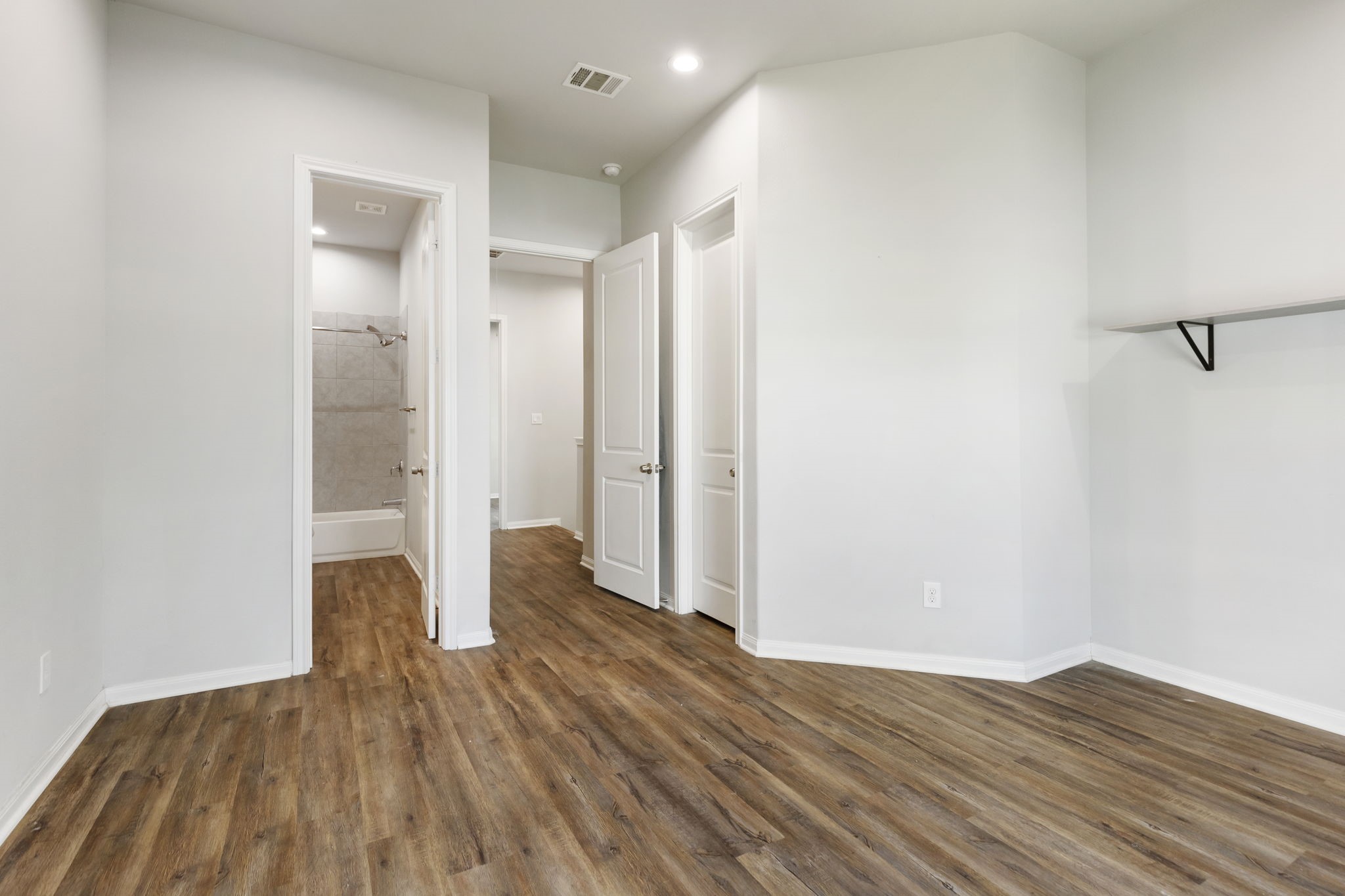 4908 Paradigm Ln Spring Spring, TX 77379 - Photo 11 of 19 a view of empty room with wooden floor
