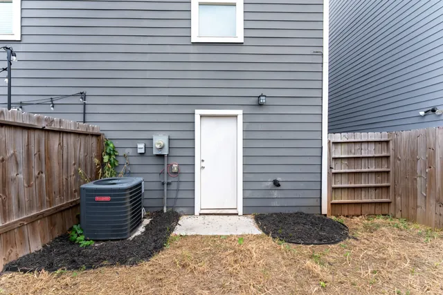 a view of a backyard and chair