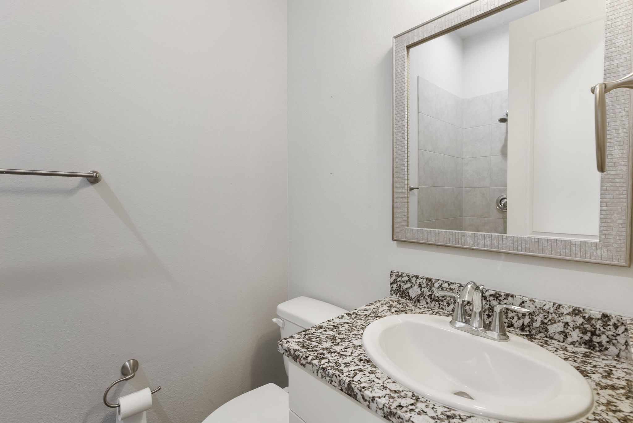 4908 Paradigm Ln Spring Spring, TX 77379 - Photo 9 of 19 a bathroom with a sink and a mirror