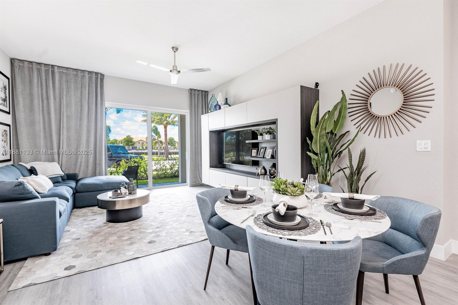 9155 Northwest 57th Street, Unit 103 Tamarac, FL 33351 - Photo 7 of 32 a dining room with furniture window and outdoor view