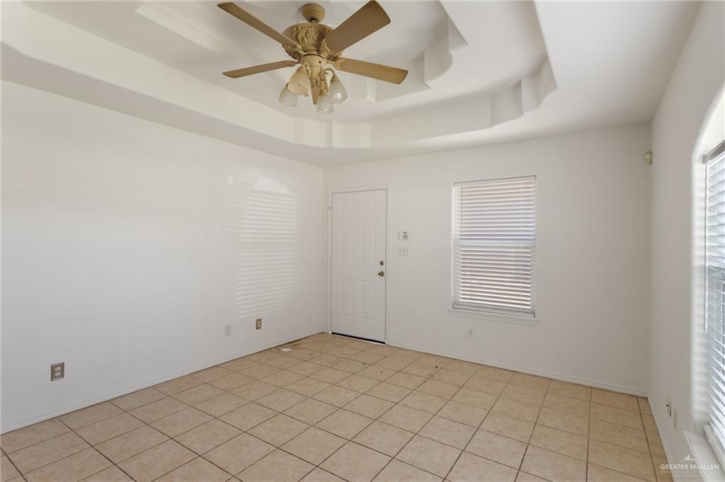 705 West Bronze Drive, Unit 1 Pharr, TX 78577 - Photo 2 of 11 an empty room with windows