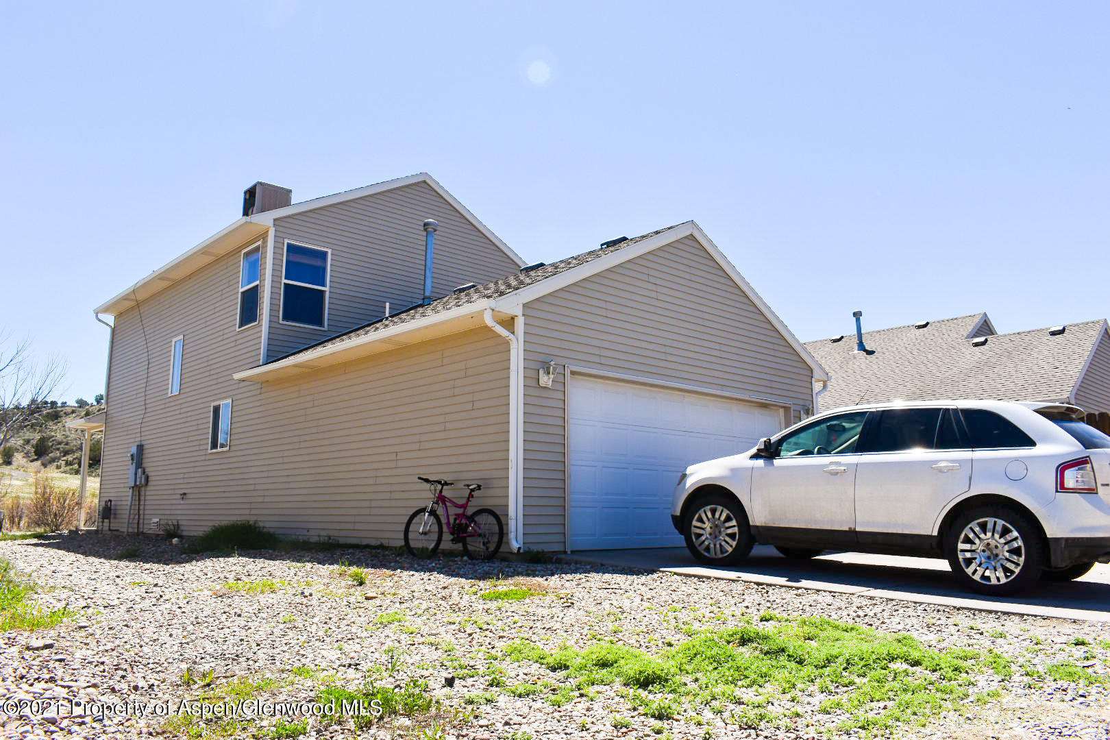 2815 Acacia Avenue Rifle, CO 81650 - Photo 13 of 14 a view of a car parked in front of a house