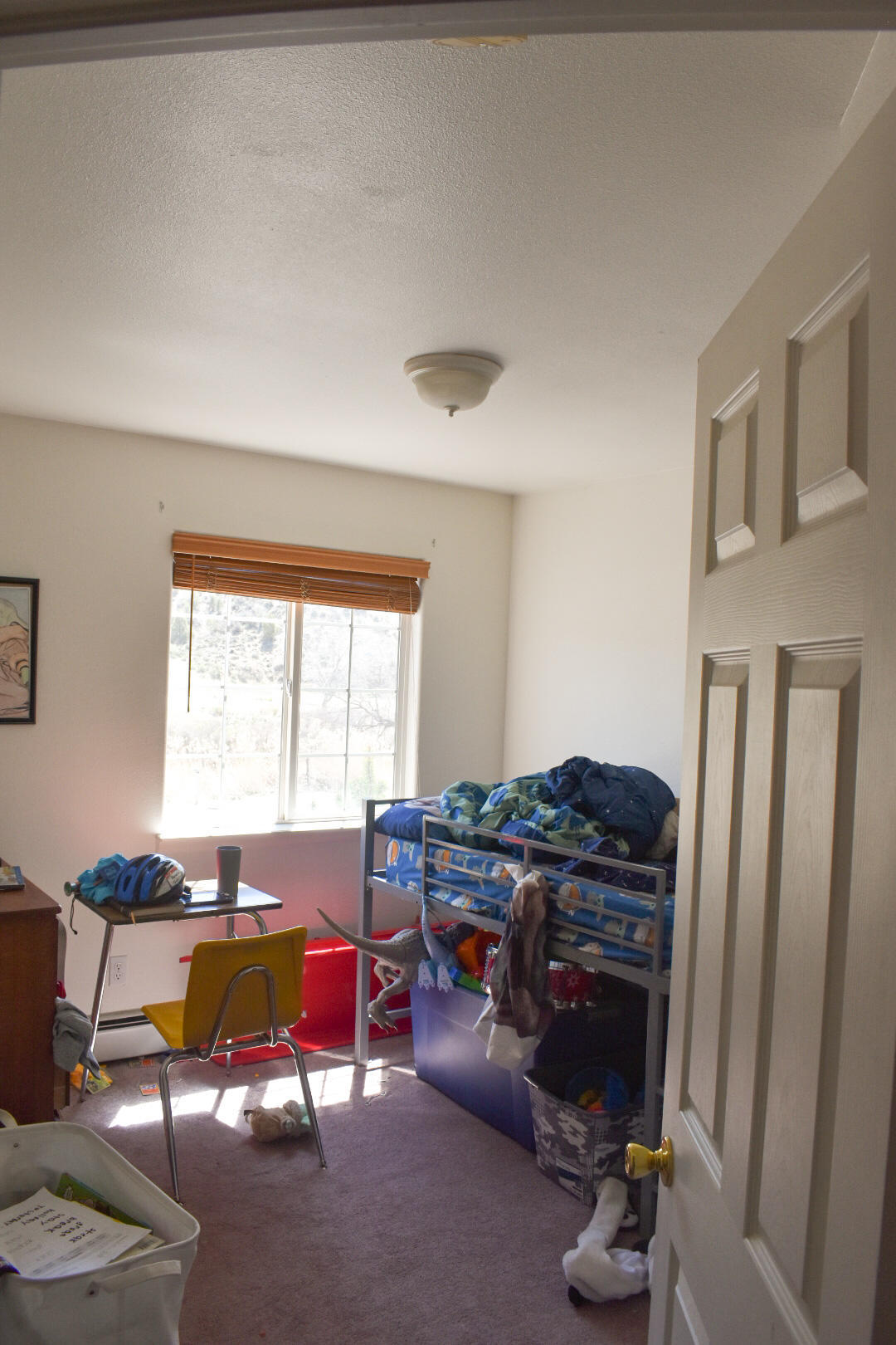 2815 Acacia Avenue Rifle, CO 81650 - Photo 5 of 14 a living room with furniture pool table and a window