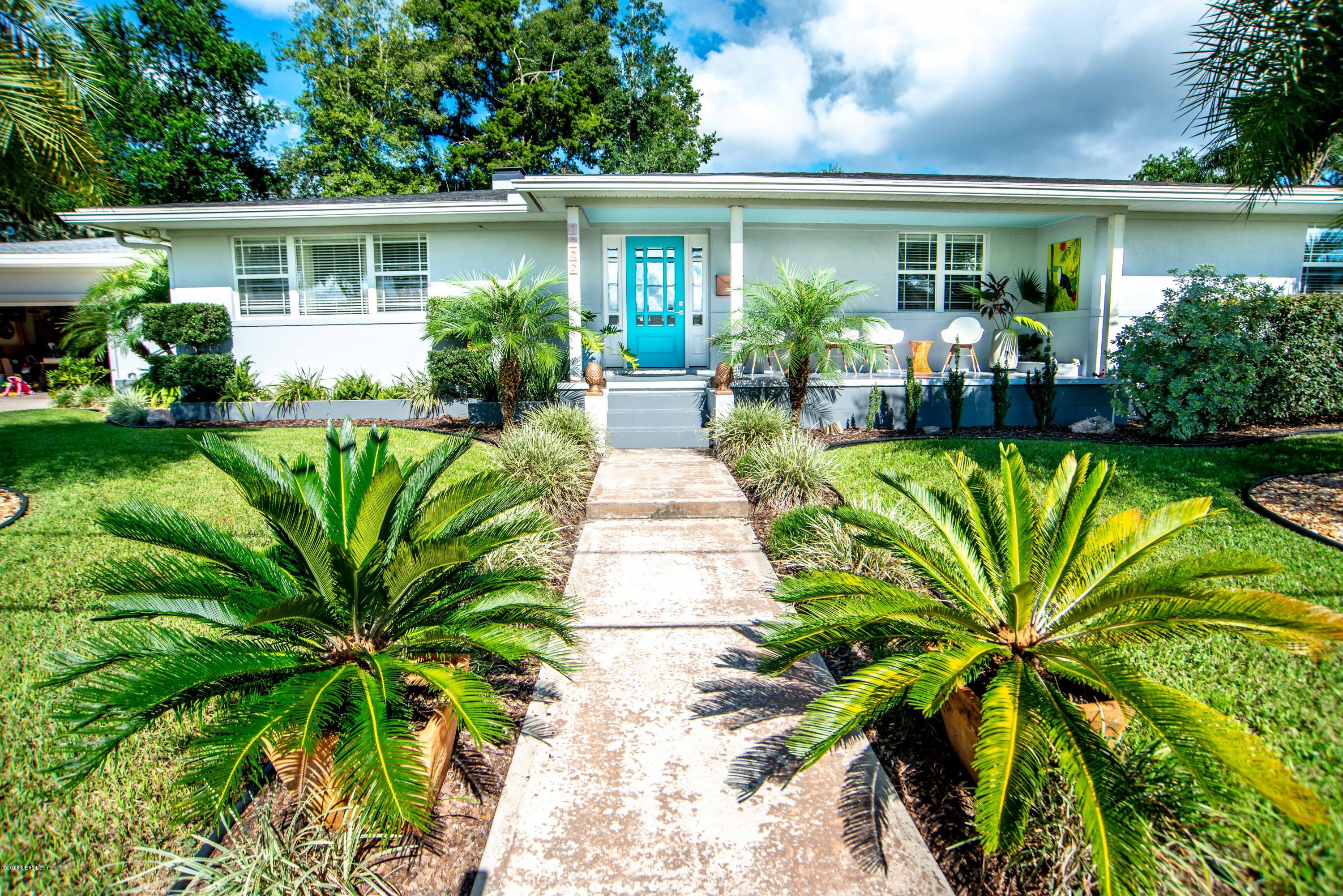 1429 Mayfair Road Jacksonville, FL 32207 - Photo 1 of 35 a front view of a house with garden