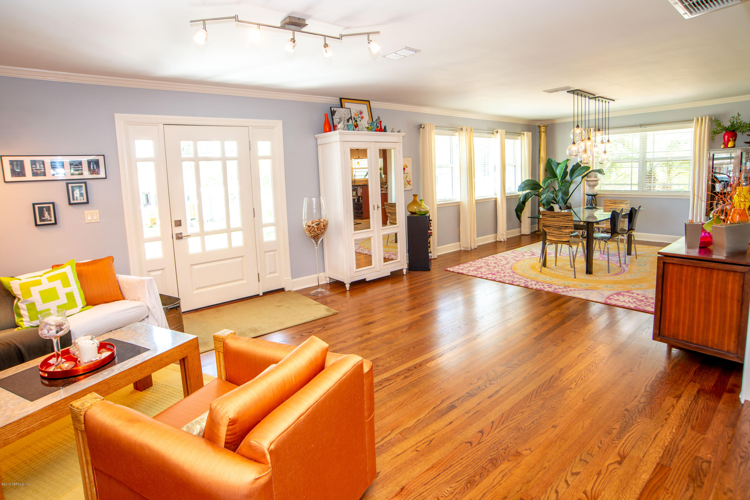 1429 Mayfair Road Jacksonville, FL 32207 - Photo 5 of 35 a living room with furniture and a wooden floor