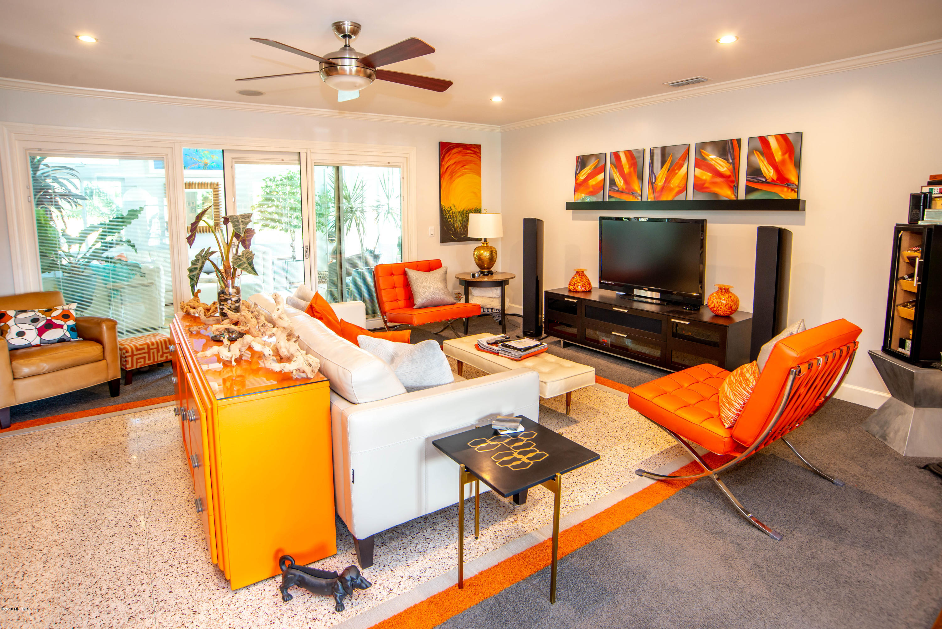 1429 Mayfair Road Jacksonville, FL 32207 - Photo 6 of 35 a living room with furniture and a flat screen tv