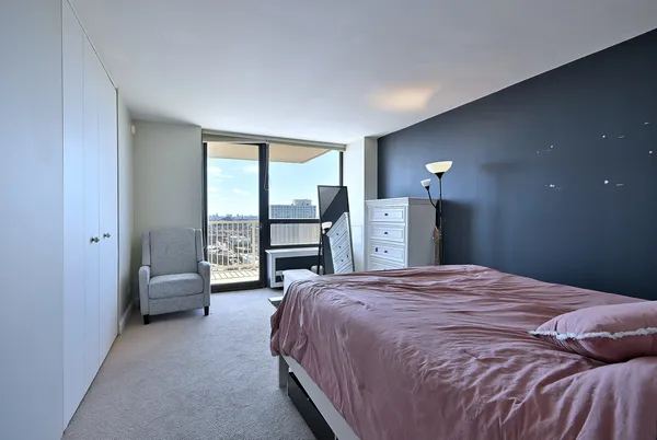 an aerial view of a house with a swimming pool and outdoor space