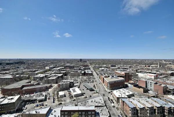 a view of a balcony with wooden floor